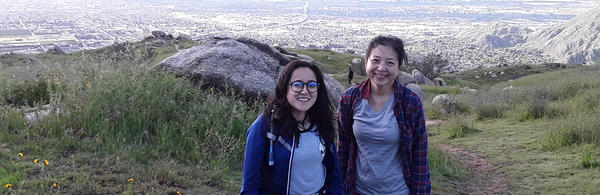 grad students hiking above the city