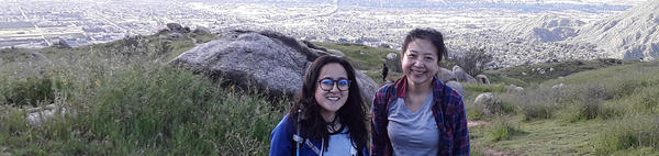 grad students hiking above the city