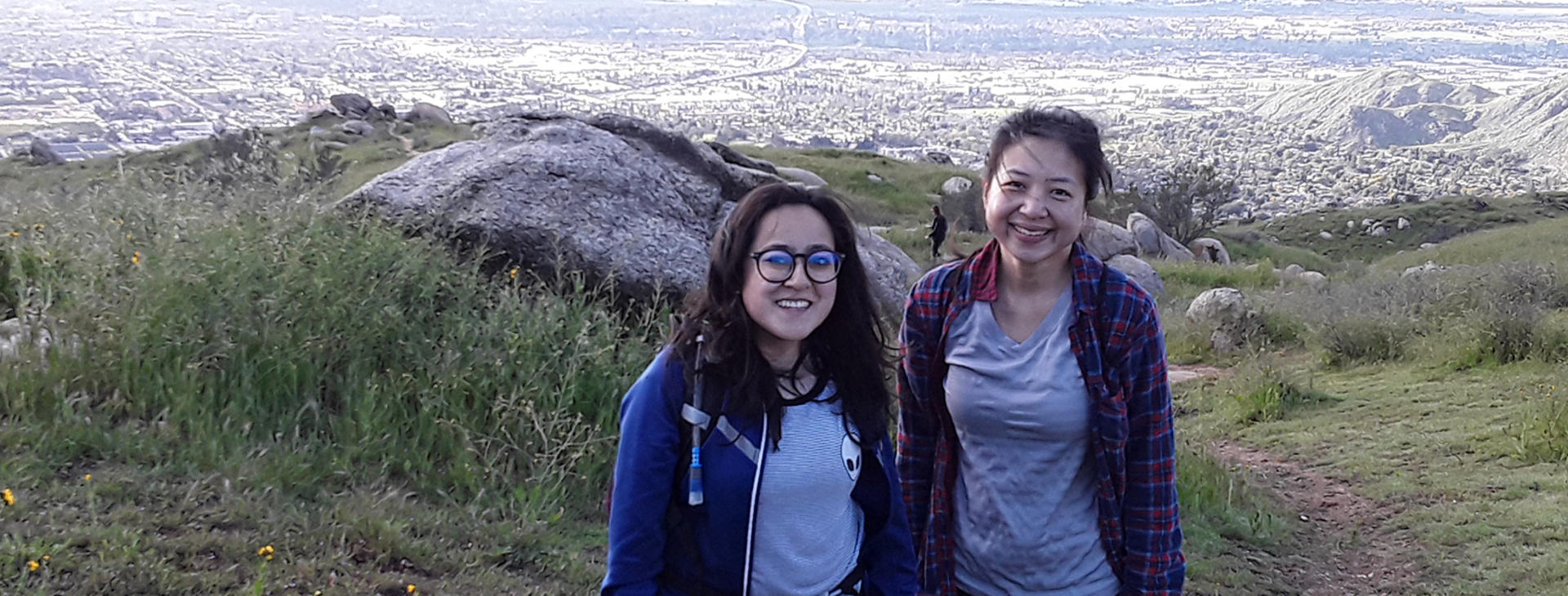 grad students hiking above the city